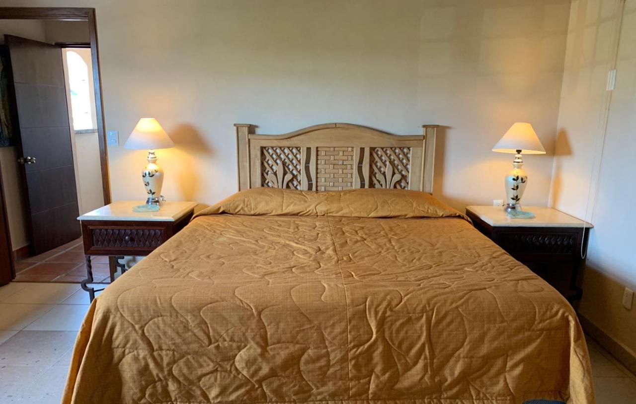 Hotel Condominium La Posada De บูเซเรียส ภายนอก รูปภาพ