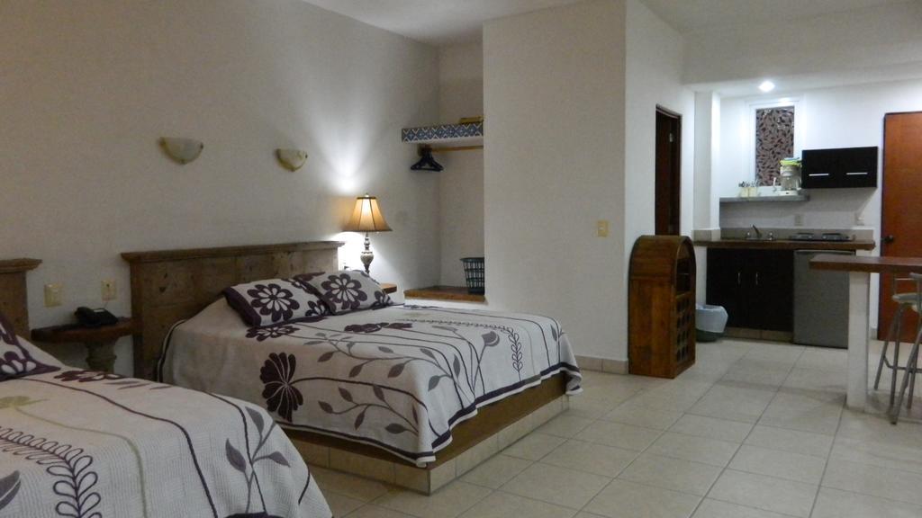 Hotel Condominium La Posada De บูเซเรียส ภายนอก รูปภาพ