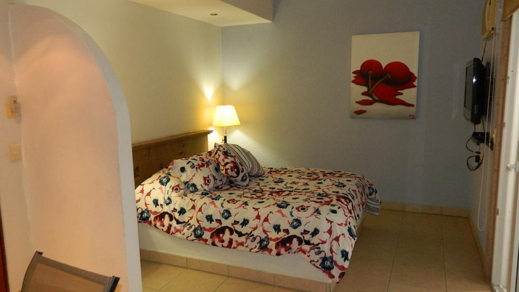 Hotel Condominium La Posada De บูเซเรียส ภายนอก รูปภาพ