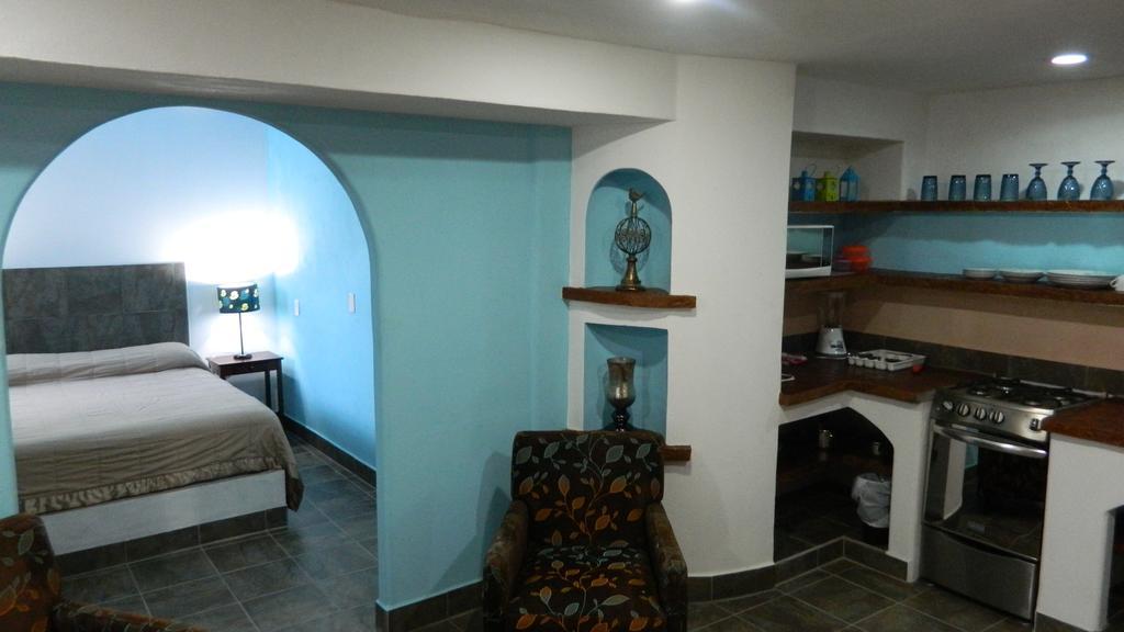 Hotel Condominium La Posada De บูเซเรียส ภายนอก รูปภาพ