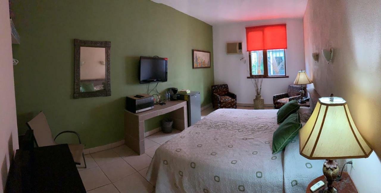 Hotel Condominium La Posada De บูเซเรียส ภายนอก รูปภาพ