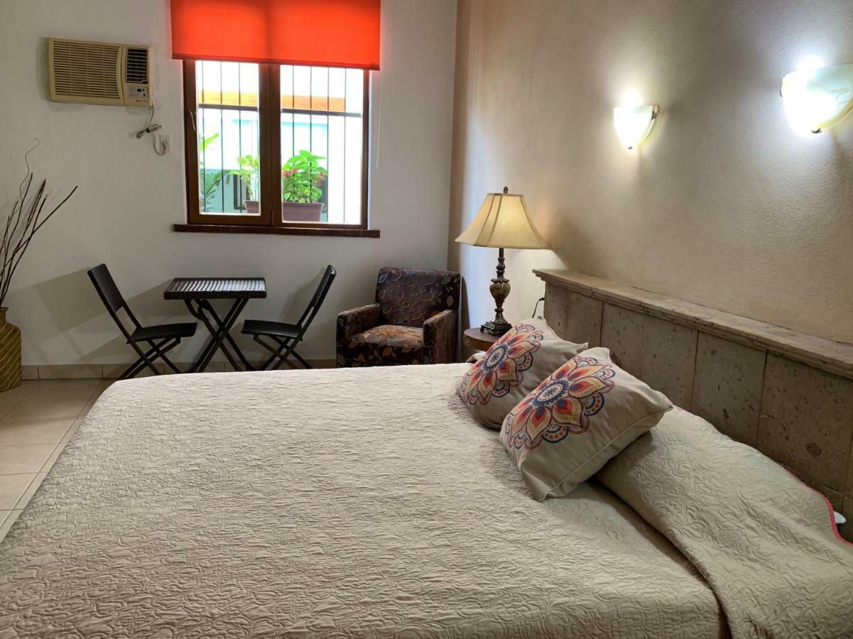Hotel Condominium La Posada De บูเซเรียส ภายนอก รูปภาพ