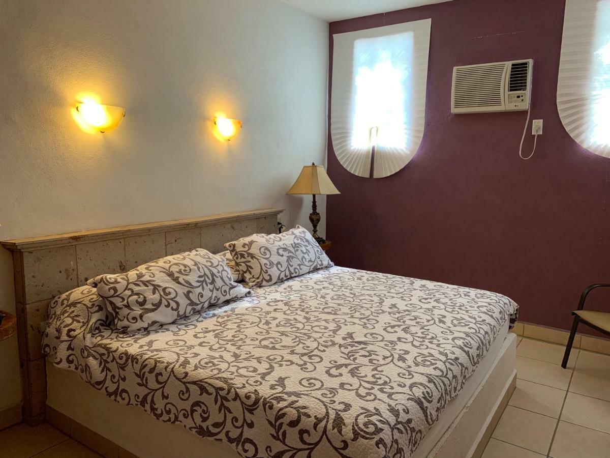 Hotel Condominium La Posada De บูเซเรียส ภายนอก รูปภาพ