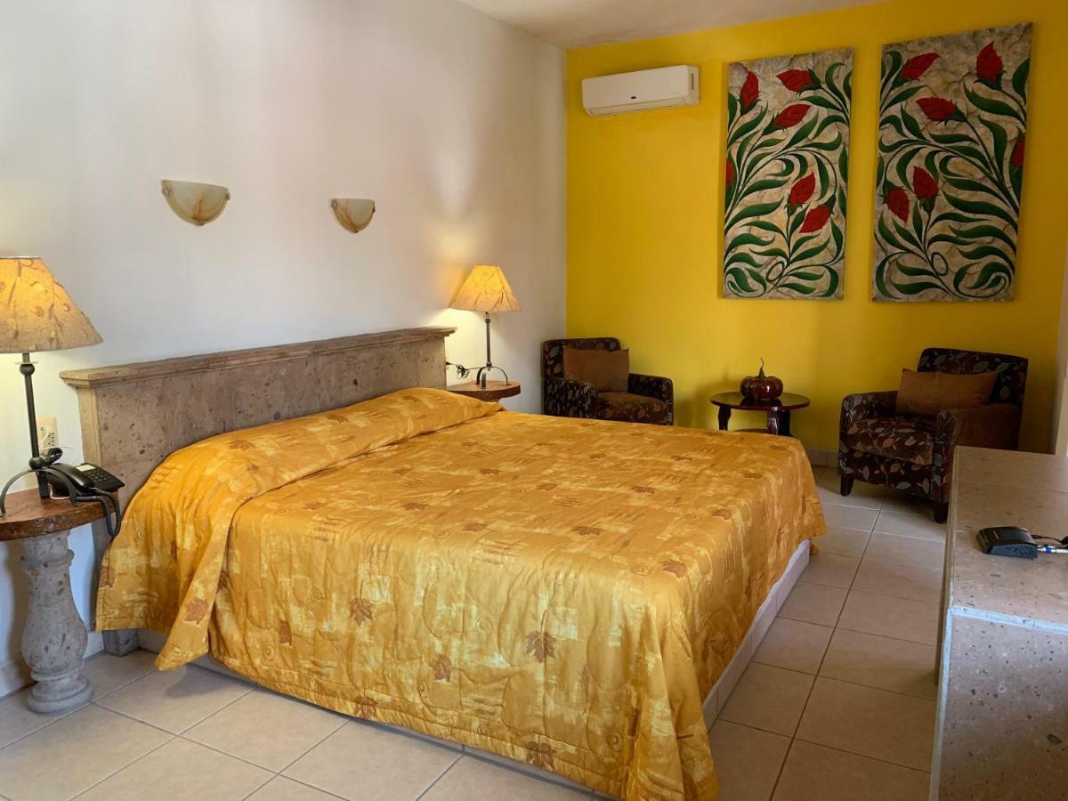Hotel Condominium La Posada De บูเซเรียส ภายนอก รูปภาพ