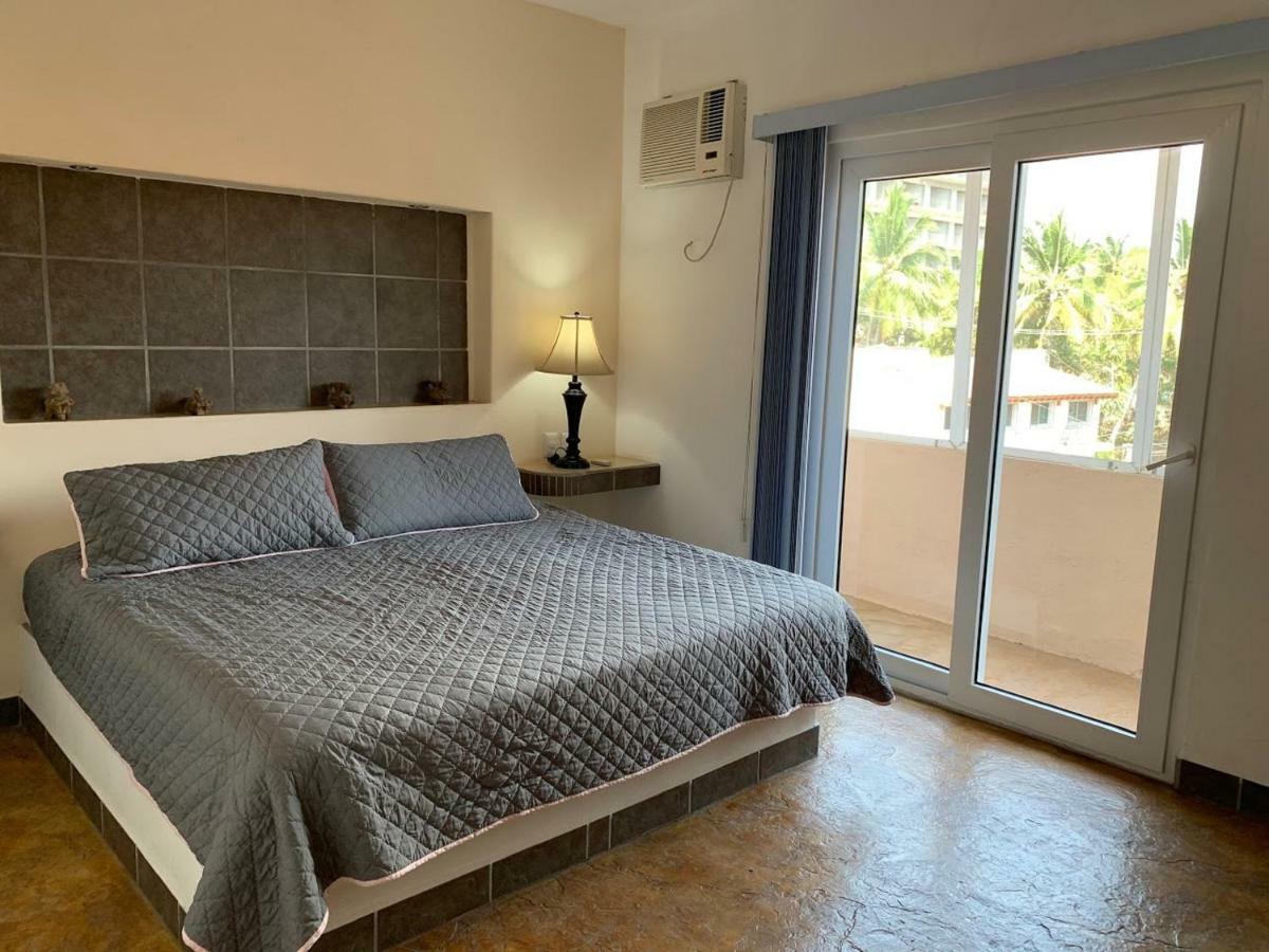 Hotel Condominium La Posada De บูเซเรียส ภายนอก รูปภาพ