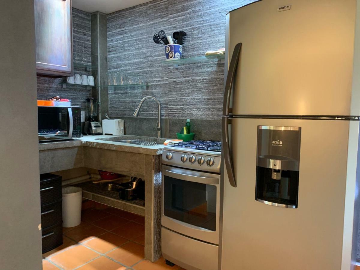 Hotel Condominium La Posada De บูเซเรียส ภายนอก รูปภาพ